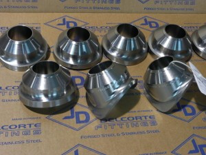 SWEEPOLETS FORGED STEEL PIPE FITTINGS: Integrally reinforced swept outlet fittings